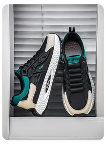 Detailed close-up of breathable color-block sneakers with thick textured soles.