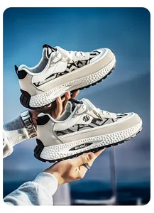 Detailed view of breathable ethnic-style patchwork sneakers with thick textured soles