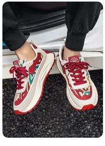 Close-up of men's breathable ethnic style sneakers featuring vibrant color-blocking patterns