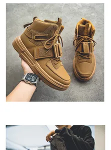 Vista dettagliata di sneaker tattiche high-top kaki con fibbie e cinturini di design