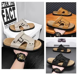 Vista detallada de las sandalias de cuero para hombre en beige, canela y negro