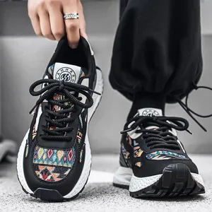 Stylish men's ethnic patchwork sneakers, breathable designer outdoor sport joggers.