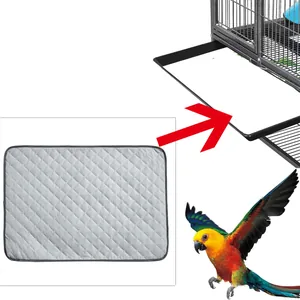 Diagrama que muestra un forro absorbente para jaula de pájaros en una bandeja