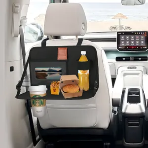 Foldable car back seat organizer with tray table and tablet holder shown in use