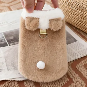 Detailed close-up of a furry winter pet vest featuring cute bear ears and a metal leash D-ring