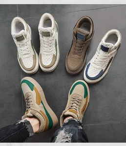 Top-down view showing multiple colors of stylish mid-top casual men's board shoes