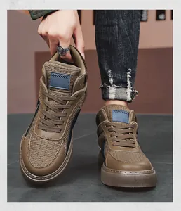 Close-up of brown mid-top casual shoes for men featuring a unique woven texture on the upper.