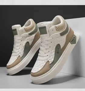 Detailed side view of stylish men's beige and olive green high-top casual sneakers