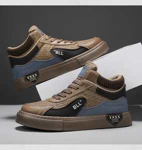 Detailed side view of men's mid-top casual sneakers in brown and black colorblock