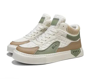 Detailed side view of beige mid-top casual sneakers with green accents and woven texture