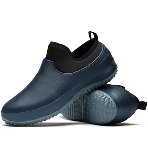 Detailed macro view of blue waterproof outdoor shoe with a non-slip sole pattern