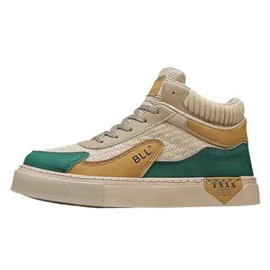 Stylish men's mid-top casual sneakers with knit collar and color-block design.