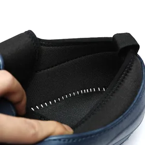 Waterproof outdoor wading shoe interior detail with durable white stitching and lining