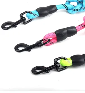 Detail view of reflective braided dog leashes featuring durable black metal snap hooks