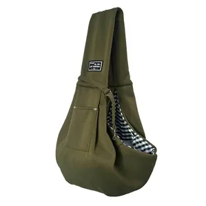 Detail view of army green pet sling carrier featuring a checkered lining and side pocket