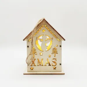 Detailed view of a wooden Christmas house LED hanging ornament with XMAS cutout