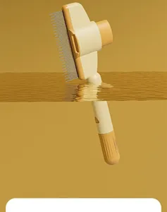 Detail of a pet grooming comb submerged in water showing its easy-to-clean design.