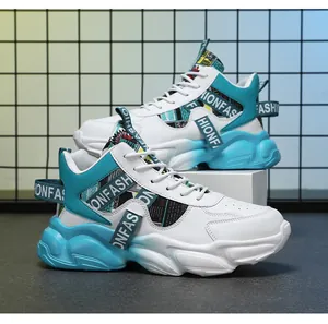 Side view of men's chunky turquoise basketball sneakers with fashion print straps.