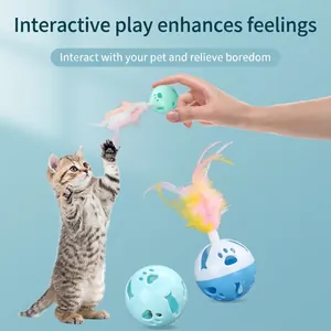 Macaron-colored plastic cat toy balls with detachable feathers for interactive pet play