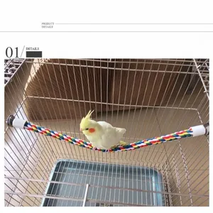 Colorful braided cotton rope perch for birds and small pets in cage installation