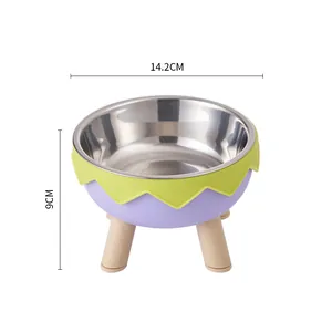 Modern elevated pet bowl with stainless steel inner and wooden legs, purple and green finish