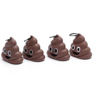 Detailed view of four brown poop-shaped dog waste bag dispensers with black carabiners