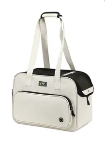 Side view of a beige portable pet carrier with breathable mesh and comfortable handles