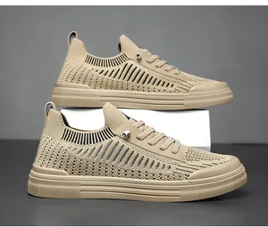 Detailed view of khaki fly-knit men's casual shoes with breathable mesh and lace-up design.