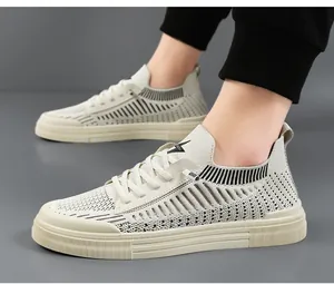 Detailed side view of premium breathable flyknit casual men's sneakers in off-white