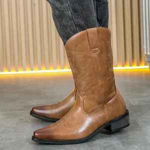 Vintage brown leather Western cowboy boots with embroidered shaft and pointed toe