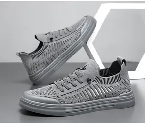 Premium grey flyknit breathable casual outdoor sneakers with stylish lace-up design for men