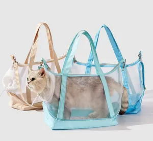 Breathable mesh pet carrier bags in mint green and beige featuring a cat inside