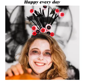 Close-up of a smiling girl wearing a spooky Halloween bloodshot eyeball headband decoration
