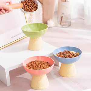Elevated ice cream cone shaped pet bowls for cats and dogs with matching food scoop