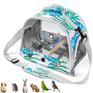Portable tropical leaf print pet carrier bag with transparent window and wood perch