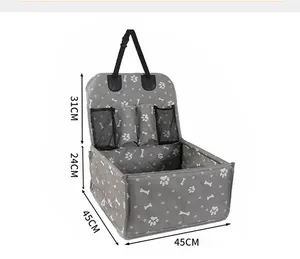 Detail view showing dimensions of a foldable grey dog car seat with paw prints.