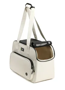 Portable cream pet carrier bag featuring a mesh window and large side storage pocket