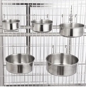 Set of five different sizes stainless steel hanging dog bowls on a metal wire cage