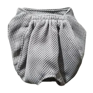Close-up view of breathable mesh cat muzzle mask for anti-biting and grooming safety