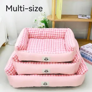 Cozy pink checkered pet bed stacked in three sizes suitable for small and medium dogs and cats