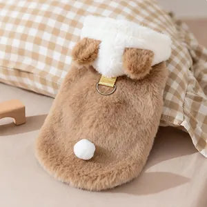 Close-up of brown plush pet coat with cute bear ears and functional leash D-ring attachment