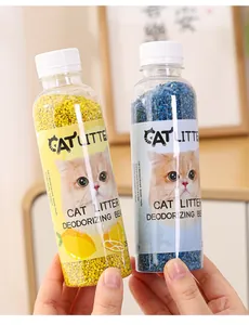 Detail showing lemon and sea scent cat litter deodorizing beads in transparent bottles.