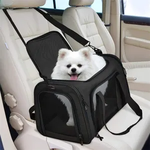 Breathable black pet carrier bag on white car seat with a small white dog inside