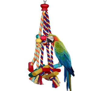 Colorful cotton rope parrot chewing toy with wooden blocks for cage enrichment.