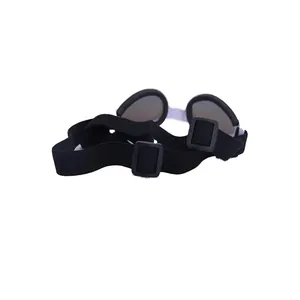 Detail of adjustable elastic straps and plastic buckles on black foldable dog goggles