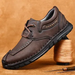 Klassieke bruine handgenaaide lederen werkschoenen voor heren met dikke antislipzool
