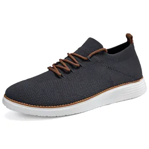 Zapatillas casual de punto gris para hombre con cordones marrones y suela blanca