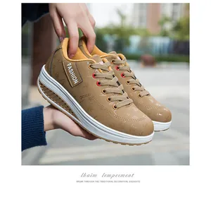Vista laterale dettagliata delle sneaker da donna con plateau e suola spessa
