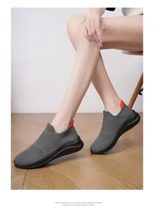 Close-up detail of lightweight grey mesh sock sneakers with EVA sole for men and women