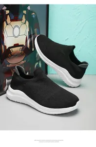 Macro view of lightweight black mesh slip-on shoe with durable white EVA foam sole